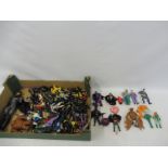 A large quantity of loose action figures, mostly Batman related.