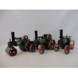 A grouping of Mamod live steam traction engines and road rollers, all fired.