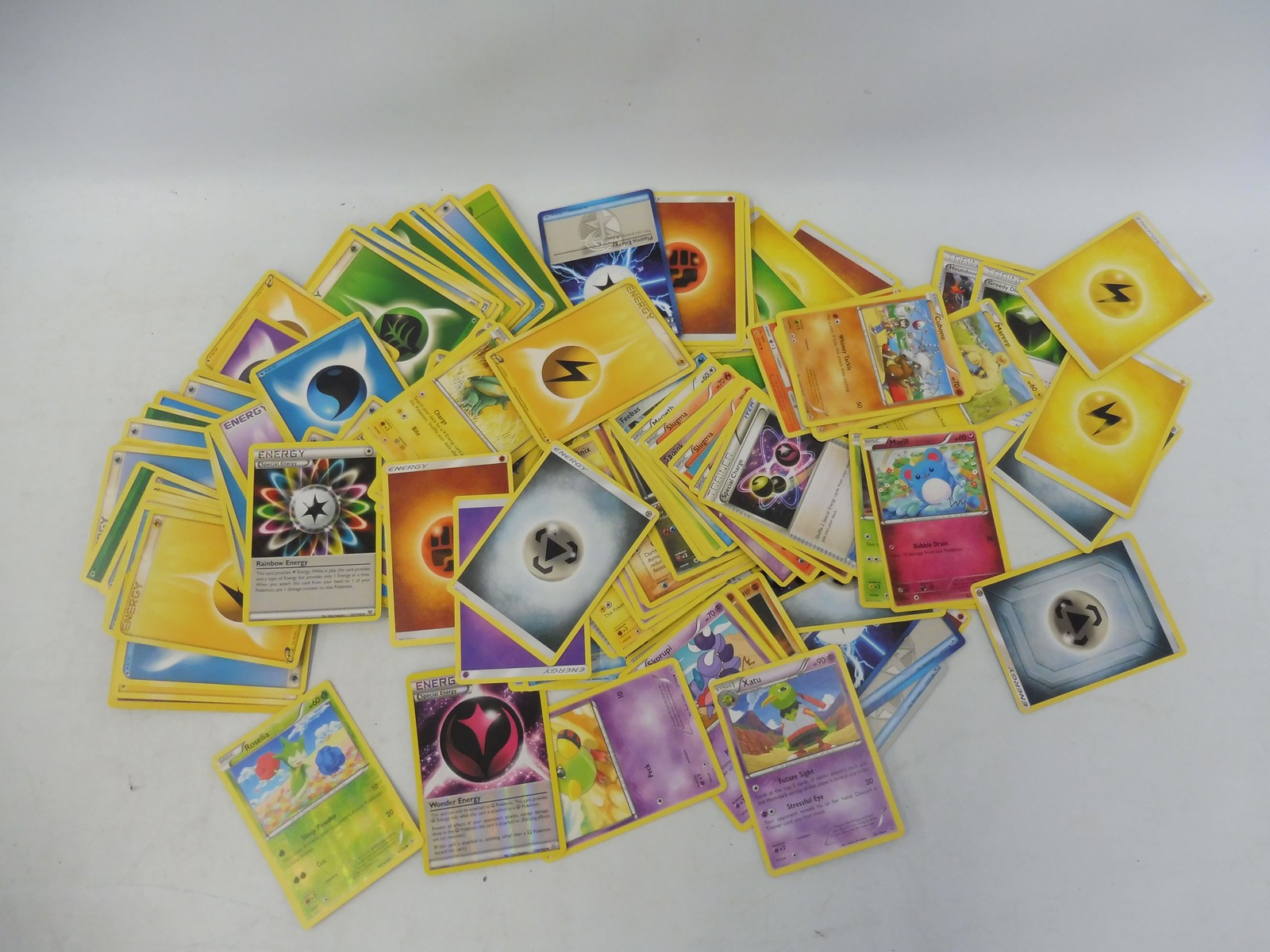 Pokemon tin full of Holo, commons and uncommon cards around 500 in good condition. - Image 3 of 3