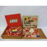 A Lego System wooden set, and one other.