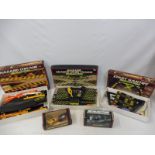 A selection of boxed and unboxed Scalextric accessories including a Start Gantry, a Hazard Change-
