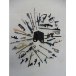 A collection of original Star Wars weapons, blasters, staffs, C3PO's poncho, light sabres etc.