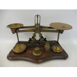 A large set of Edwardian postal scales, with graduated brass weights.