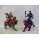 An original He Man battle cat complete with weapons, armour etc. together with Skeletor's battle