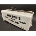 A Wilson's Cooked Corned Beef enamelled shop dispenser, 11 x 5 1/2 x 5 1/2".