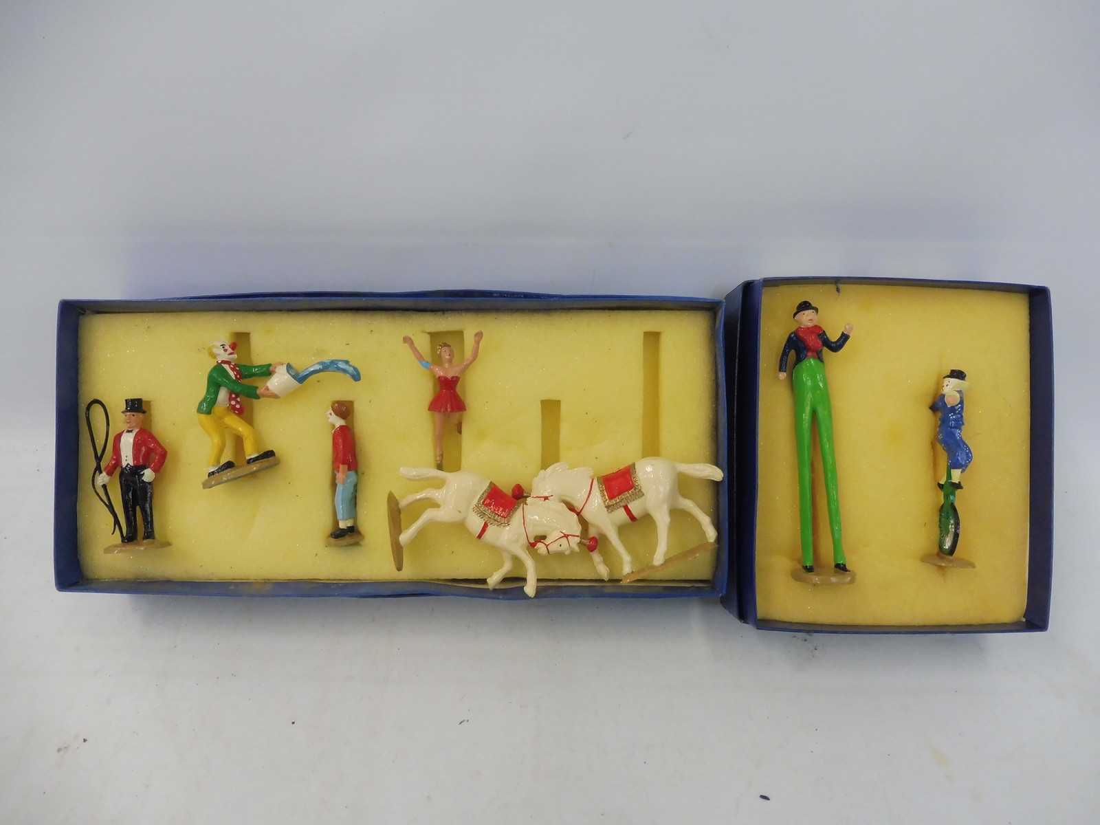 Two small boxes of Marlborough circus figures.