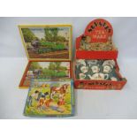 A circa 1950s nursery tea set in original box, with images of a golly and other toys.