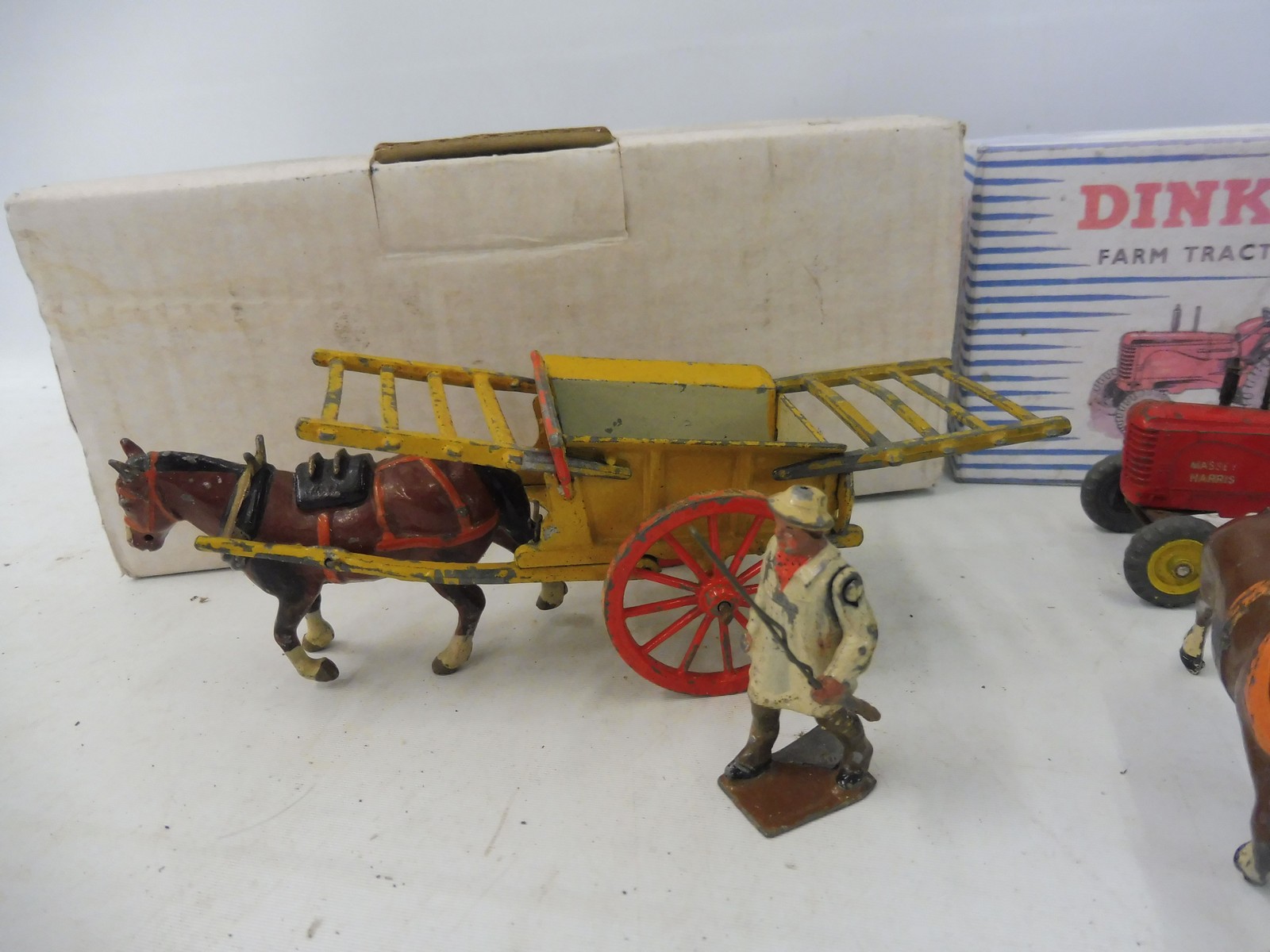A selection of Britains farm and Dinky, to include a farm tractor and hay rake in a reproduction - Image 3 of 4