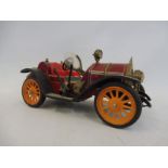 A Schuco 'Mercer' tinplate clockwork car, no. 1225.