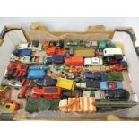 A large box of mainly good Dinky, Corgi, Solido and other vehicles.