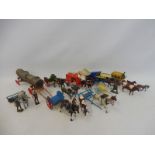 A good selection of original Britains lead die-cast to include carts, milk floats etc.