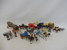 A good selection of original Britains lead die-cast to include carts, milk floats etc.