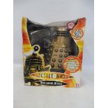 A large scale boxed radio controlled Dalek.