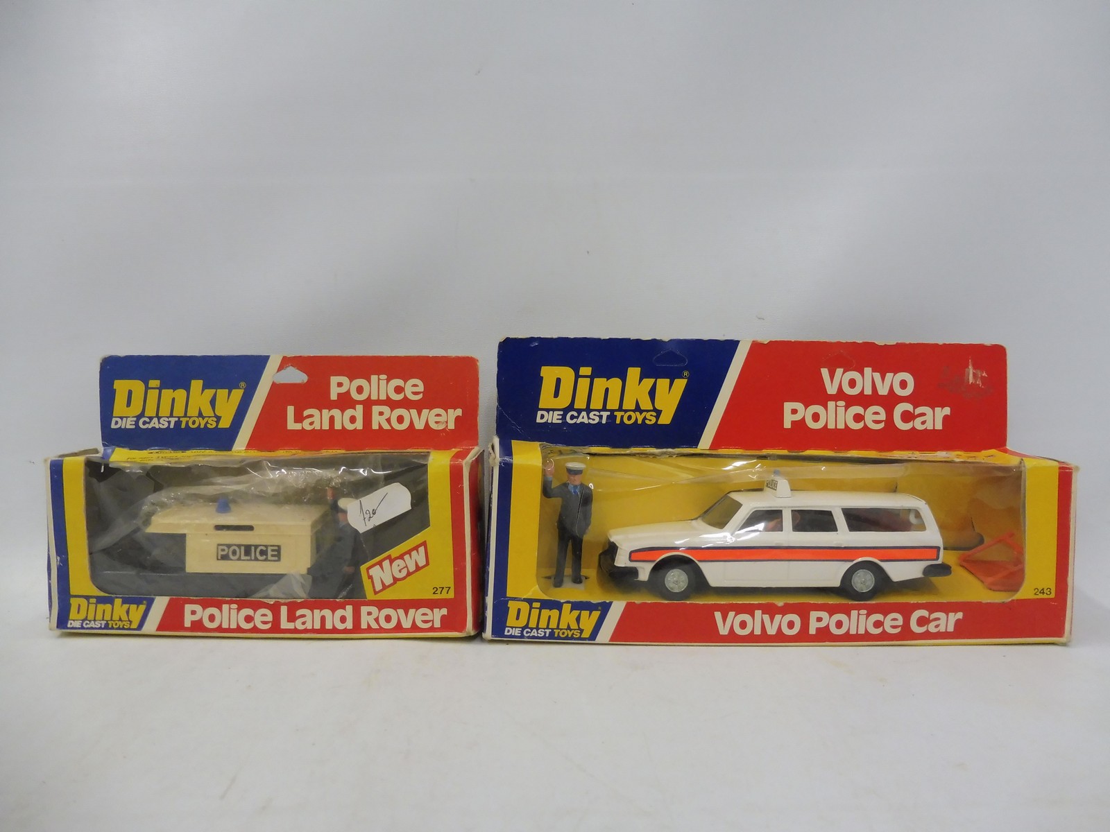 Two circa 1970s Dinky Toys, Police Landrover and the Volvo Police car with accessories, boxes