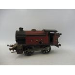 A Hornby O gauge LMS clockwork locomotive.