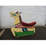 An original fairground horse in original paint with original seat and bracket from an ark ride,