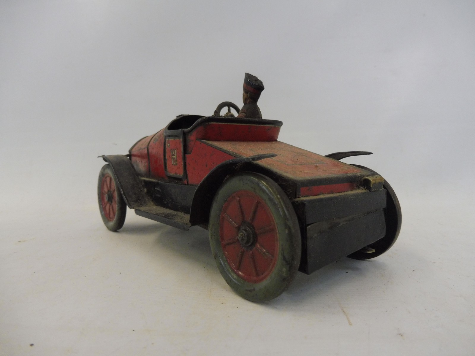 An early tinplate clockwork model car 'Hessmobil 1020'. - Image 5 of 8