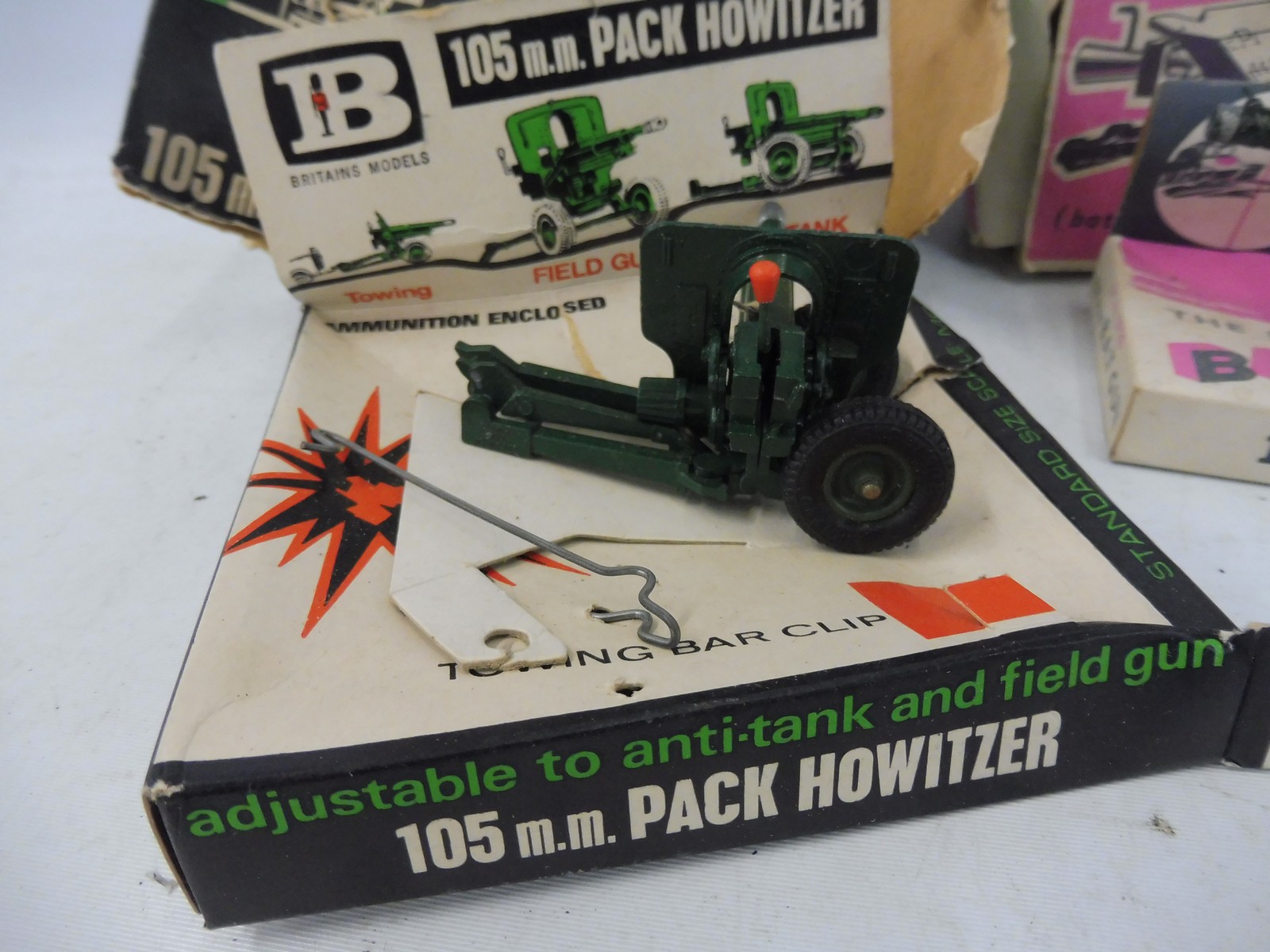 Three Britains military models to include two battalion anti-tank guns and a 105 pack Howitzer. - Image 2 of 3