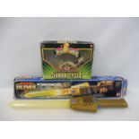 A He Man boxed power sword made by Mattell, unchecked and a Power Rangers Shark Cycle, missing