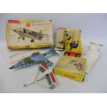 Three circa 1960s Dinky models, one a Hawker Harrier, missing the inner, a fork lift and a disc