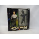 A boxed Star Wars Action Collection figure of Han Solo in carbonite block.