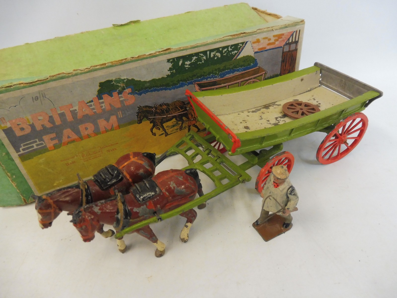 An early Britains farm wagon, box no 5F, in playworn condition but appears complete. - Image 2 of 4