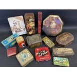 A selection of assorted tins, mostly biscuit and confectionary related, including Huntley and