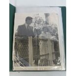 An album containing a small amount of old photographs of the Royal family, appear to be press