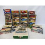 A collection of boxed Corgi Classics, various vans, plus other boxed models.