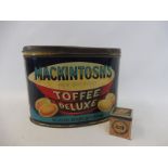 A Mackintosh's Toffee DeLuxe oval tin in good condition plus a Hartley & Palmers sample tin.