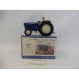 A Britains Fordson Major tractor, in original box and in good condition, swing axle.