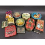 A group of small tins including biscuit sample tins, Birds Golden Raising Powder etc.