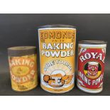 Three baking powder tins.