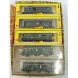 Five boxed Fleishmann DB coaches.