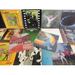 A box of classic rock LPs to include Yes, Santana, ELO and others.