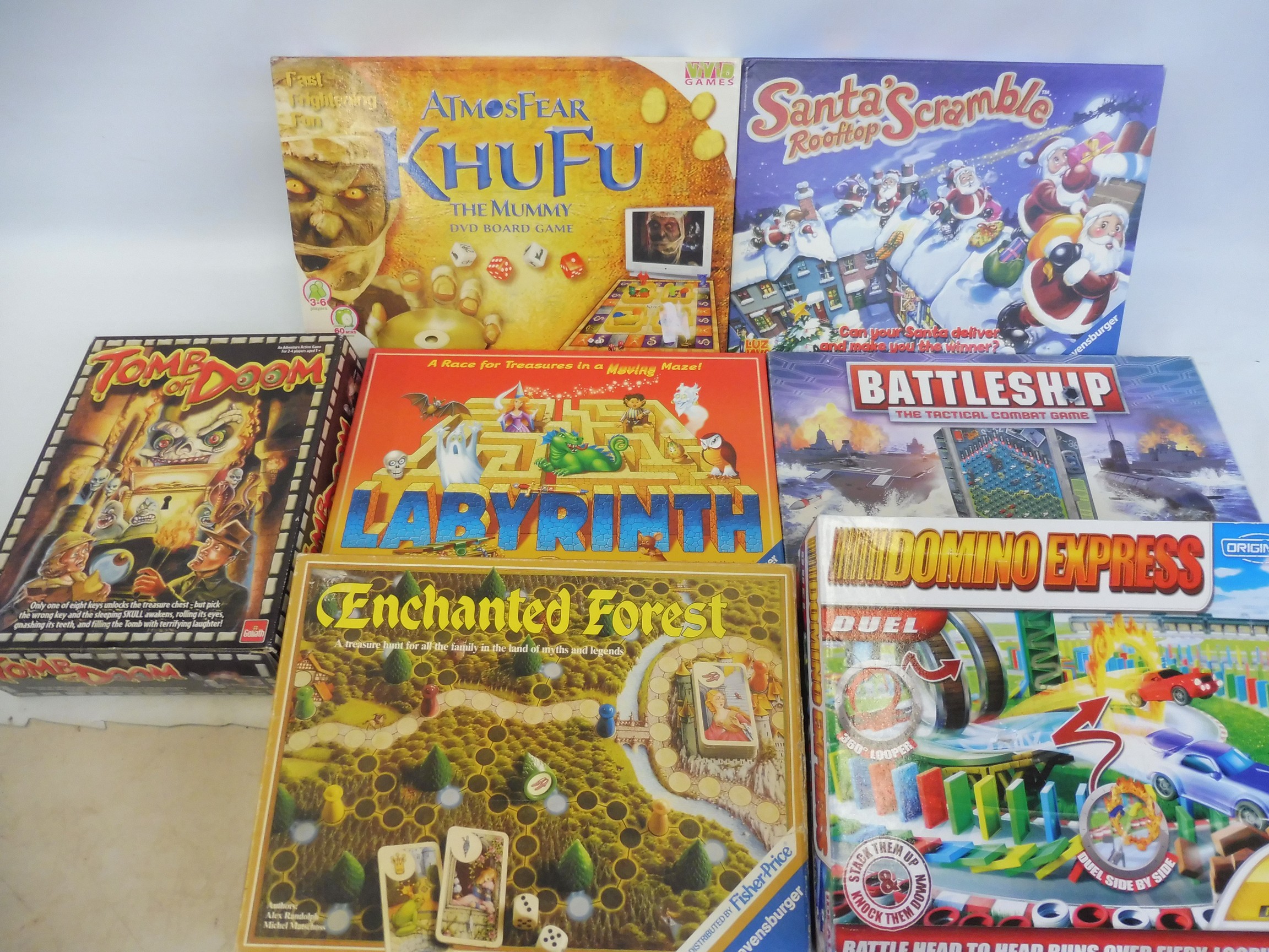 A box of mainly TV related games, different eras and makers.