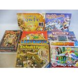 A box of mainly TV related games, different eras and makers.