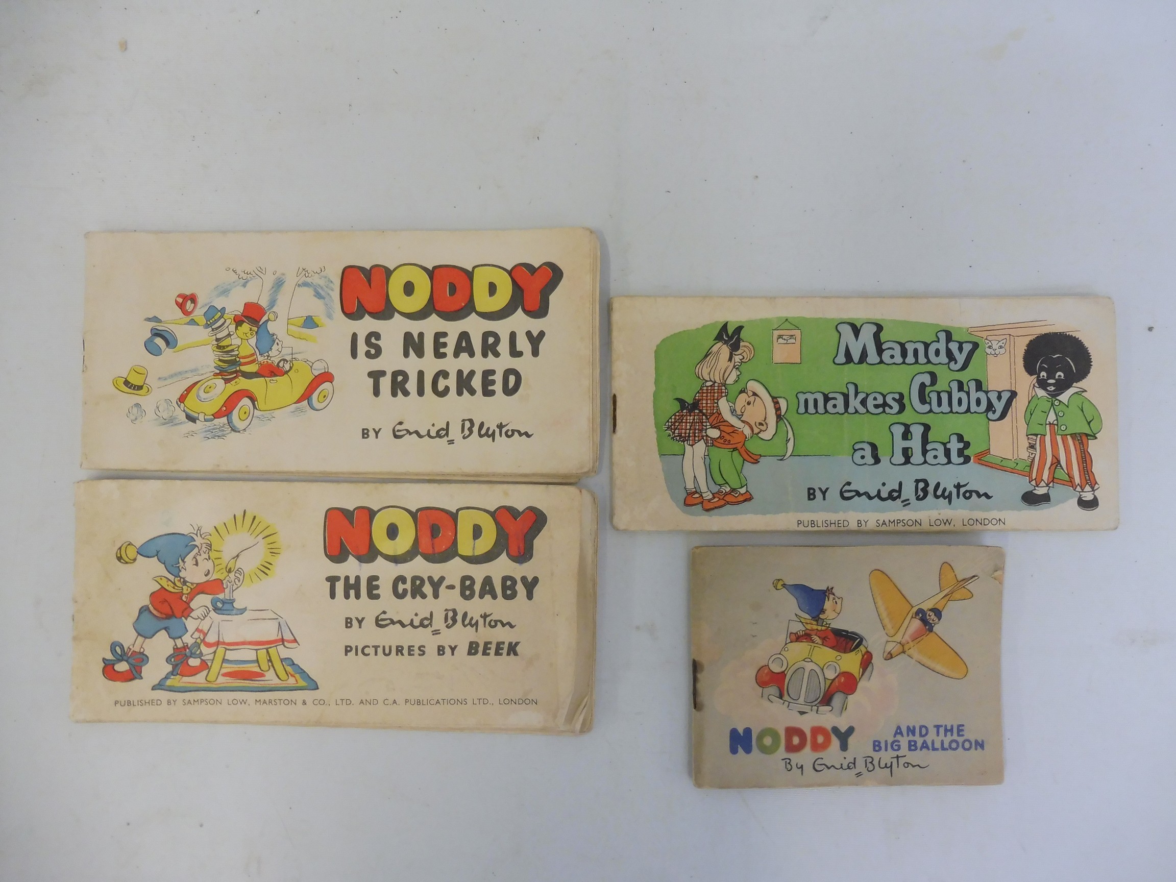 Four early Enid Blyton volumes, Noddy the Crybaby, Noddy is nearly tricked, Noddy and the big