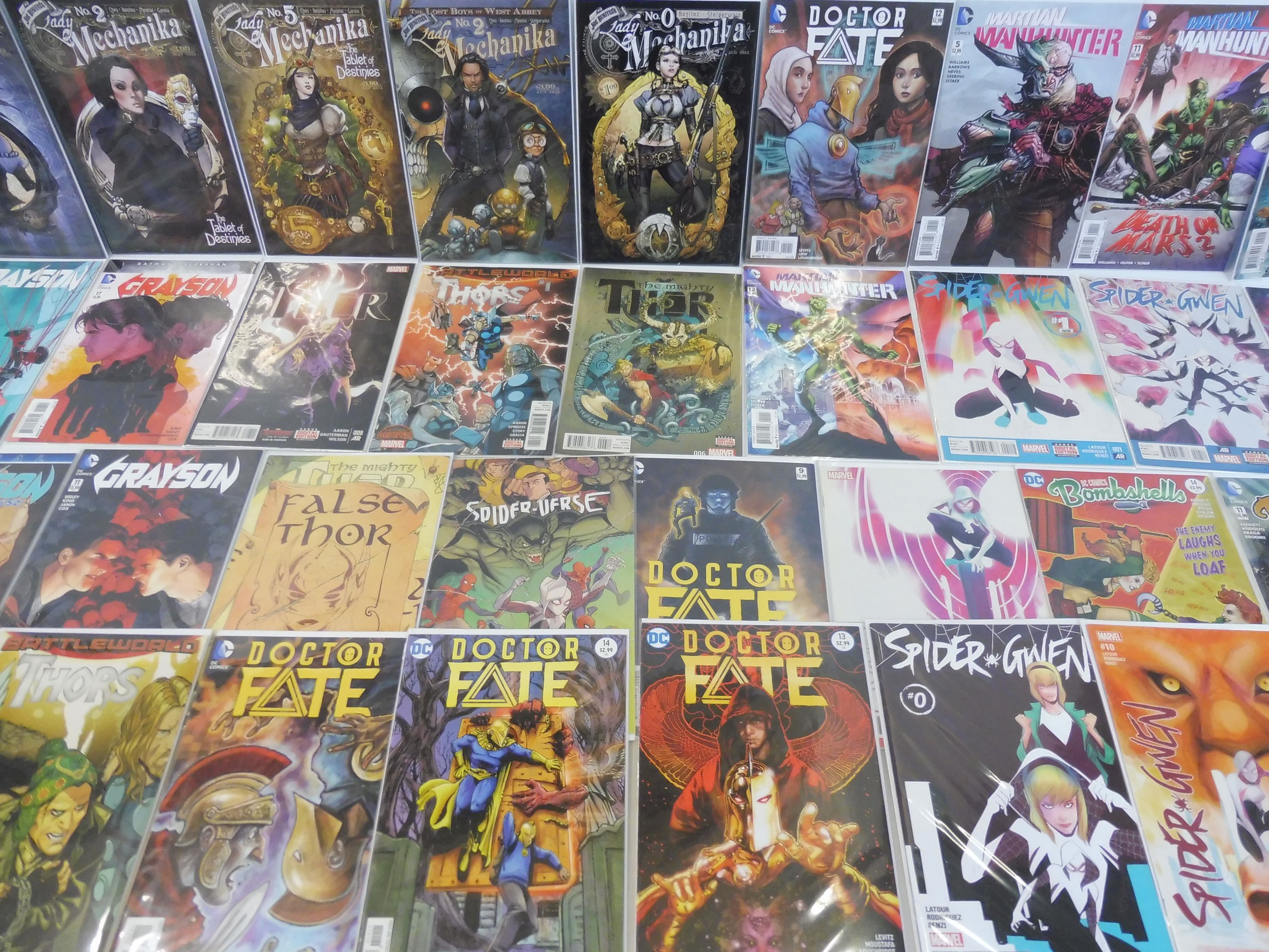 A quantity of assorted comics of different genres.