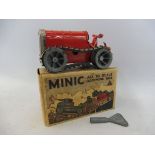 A boxed Tri-ang Minic Caterpillar tractor with key.