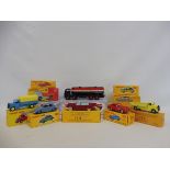 12 assorted Atlas Dinky models, mint and boxed.