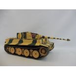 A scale model of a German Panzer tank, circa WWII, hand painted.