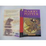 An original Harry Potter dust jacket for The Prisoner of Azkaban, signed to the front Daniel