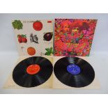 Two original Queen LPs: Disraeli Gears on the Reaction label (vinyl and cover appear in excellent