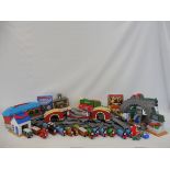 A quantity of Thomas the Tank Engine toys including diecast trains, carriages and track etc.
