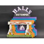 A very rare Hall's Distemper die-cut multi-layered three dimensional showcard of bright colour and