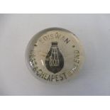 An advertising glass paperweight promoting Ediswan light bulbs.