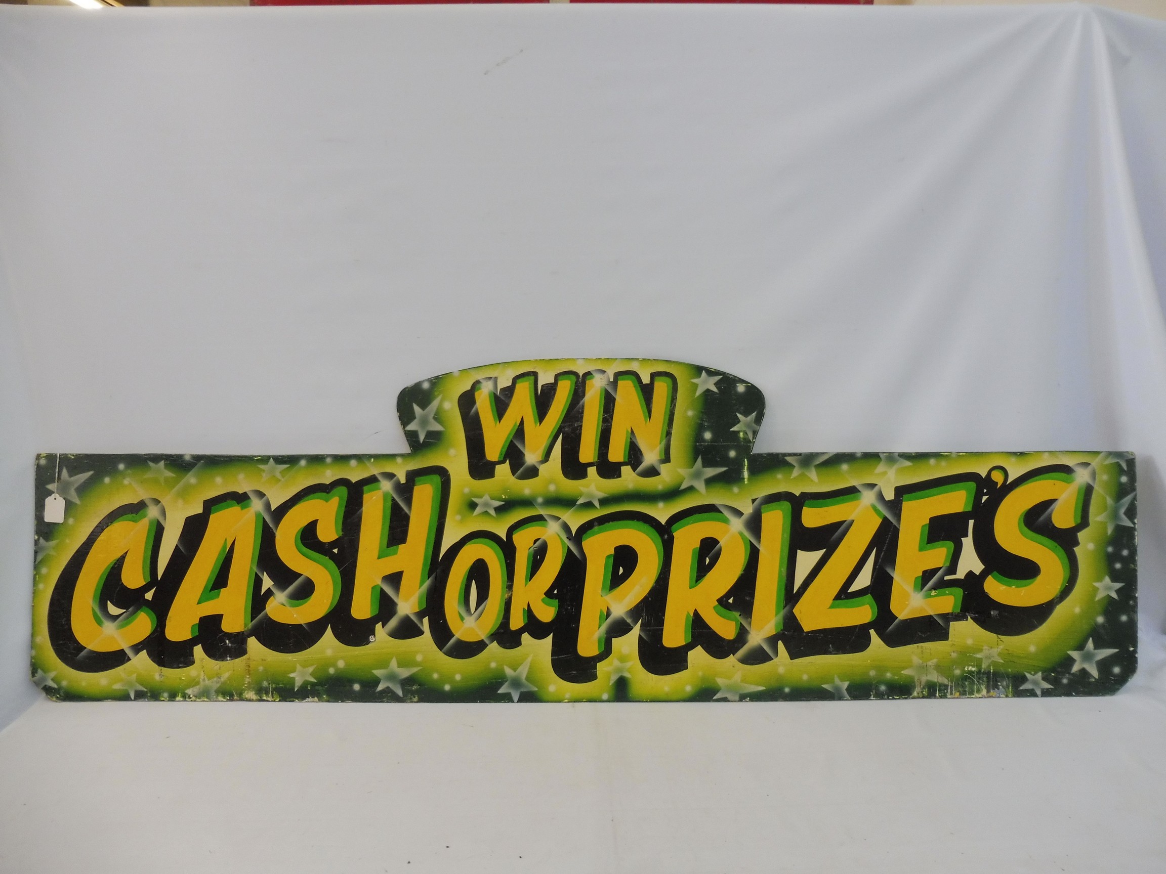 A fairground brightly coloured wooden sign 'Win Cash or Prizes', 72 x 22".