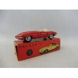 A boxed Tekno Jaguar E-Type roadster.