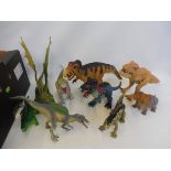 A large quantity of dinosaurs, different scales and makers.